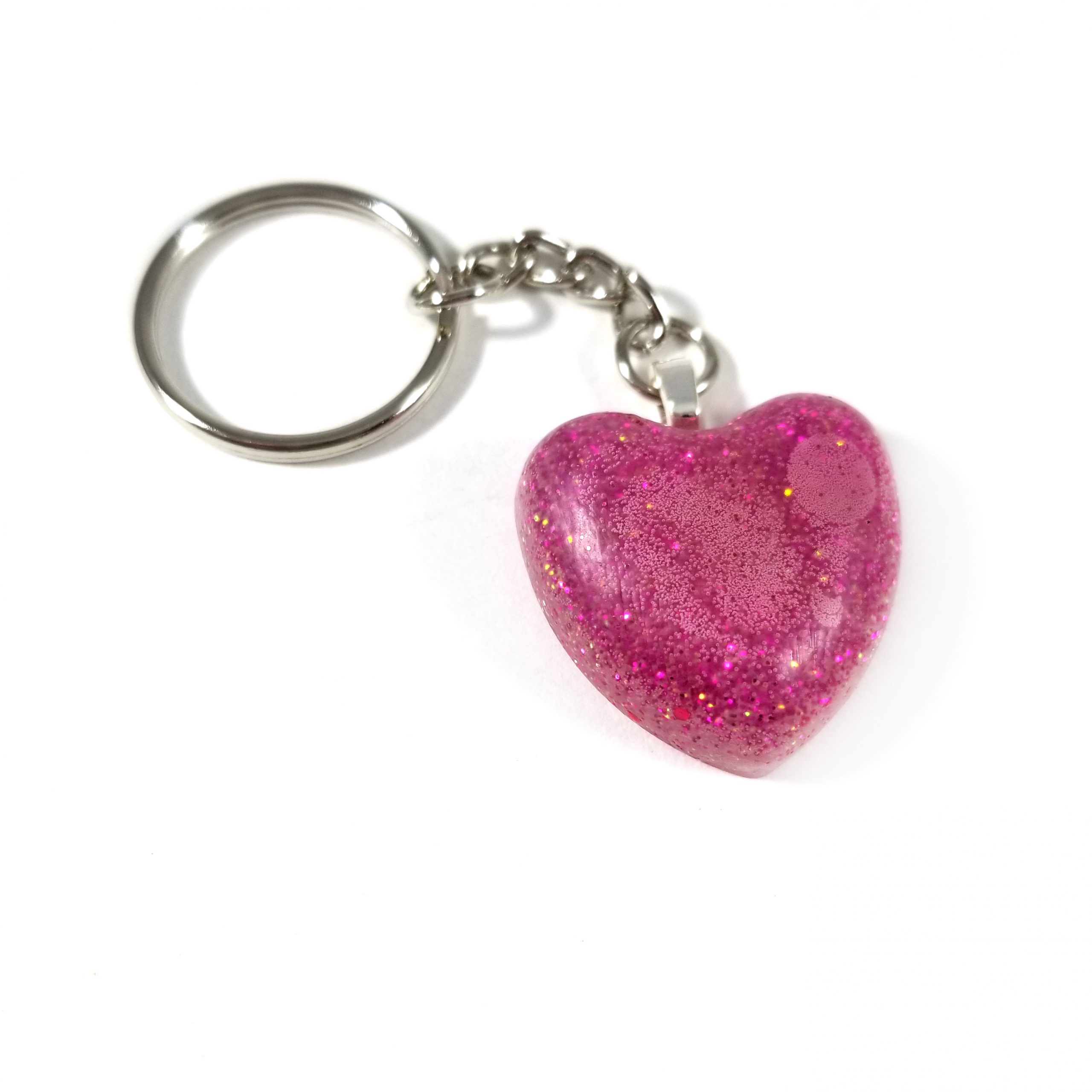 Download Glittery Magenta Heart Resin Keychain Wilde Designs