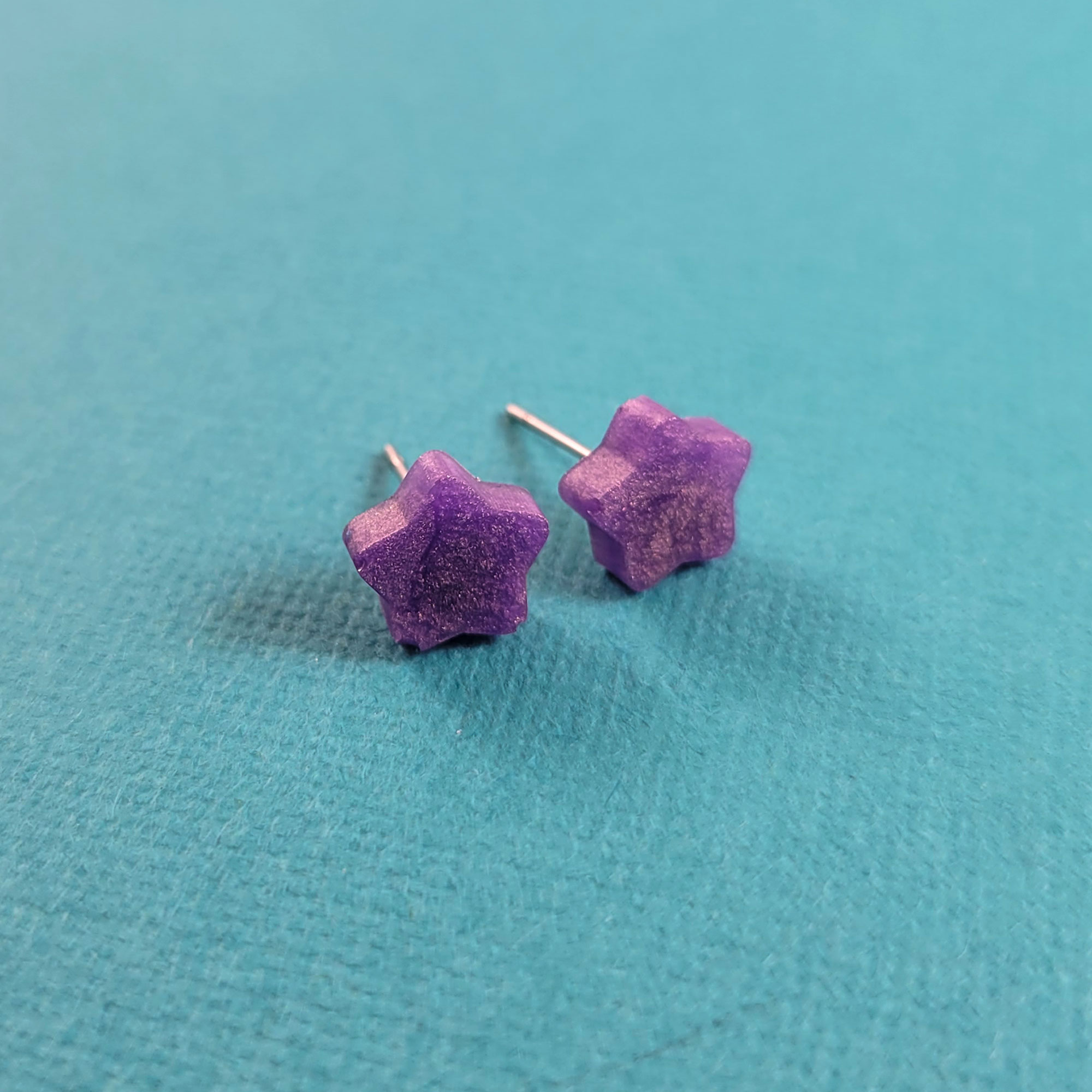 Tiny Star Stud Earrings in Color Shifting Purple by Wilde Designs