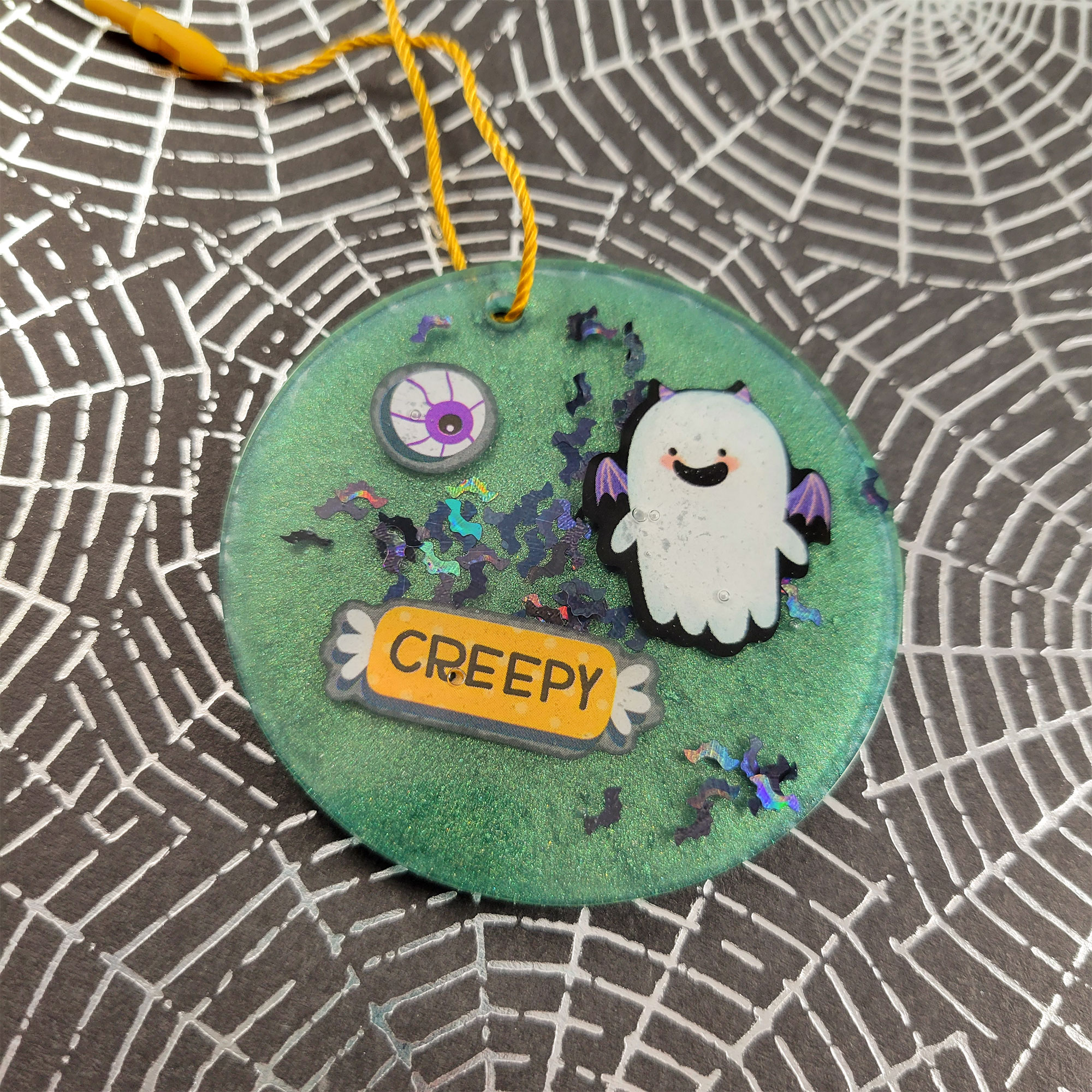 Spooky Round Ornaments by Wilde Designs